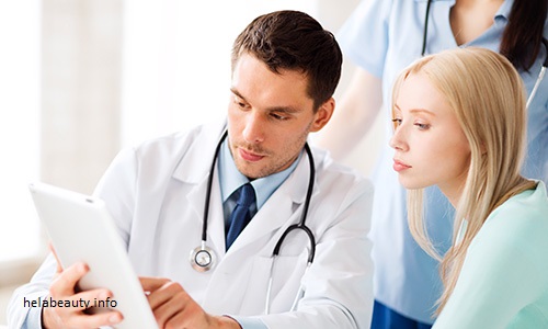 the image symbolize health insurance and show the insurance company agent explaining about health insurance plan